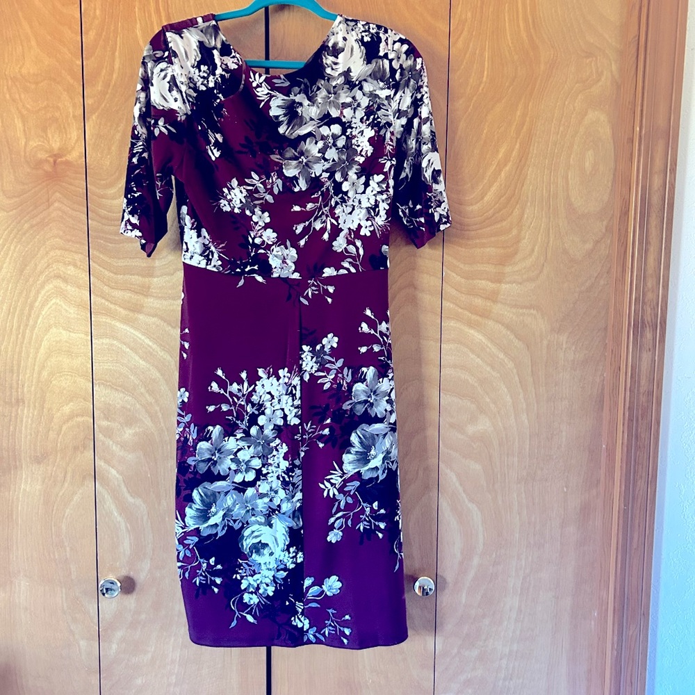 Purple with black and white flowered dress.